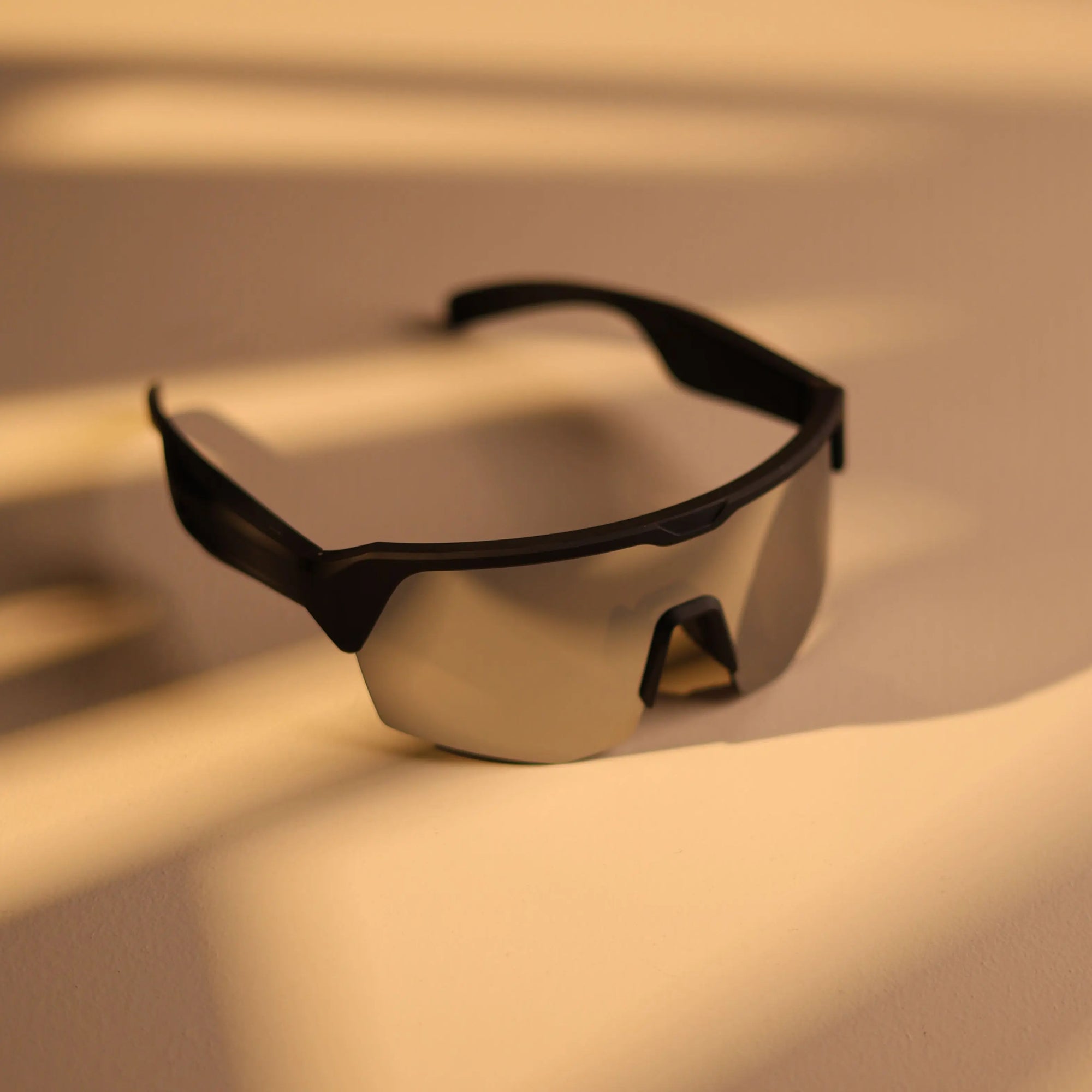 DUSK Apex smart sports sunglasses with grey mirrored lens designed for outdoor workouts