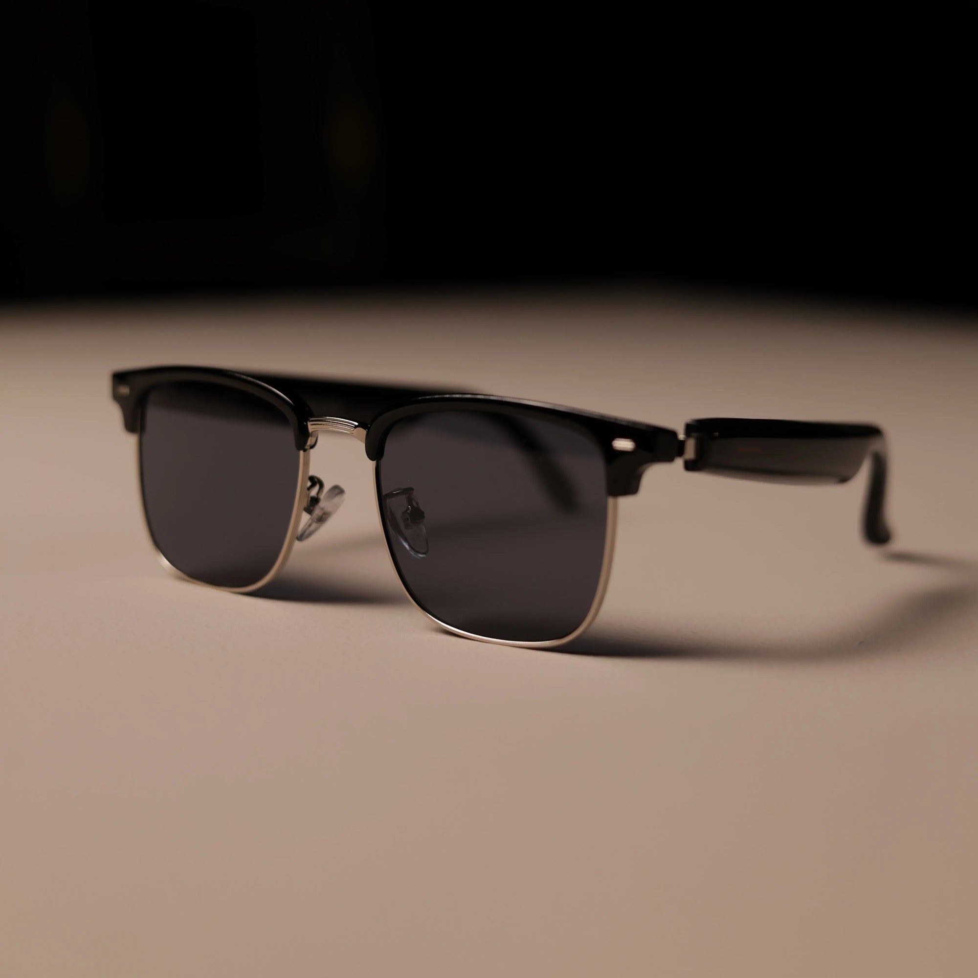 DUSK Prime smart sunglasses with polarized UV lenses and a sleek Clubmaster-style black frame
